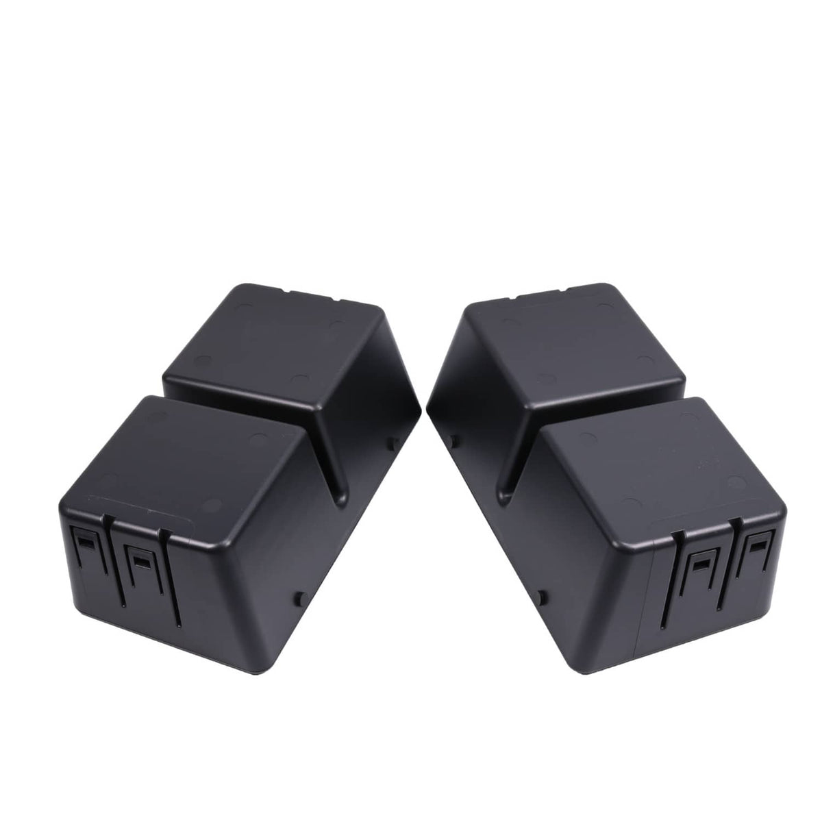 Two black cup holder bezel units with side button cutouts and molded corners