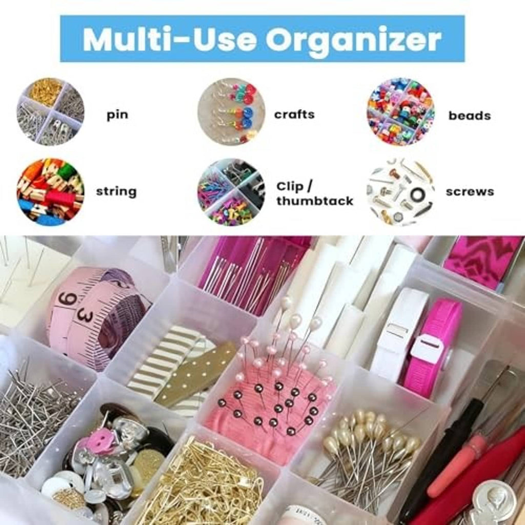 Clear multi-compartment organizer box holding assorted crafting supplies