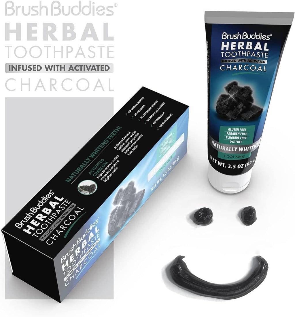 Herbal charcoal toothpaste tube and box with activated charcoal and charcoal pieces