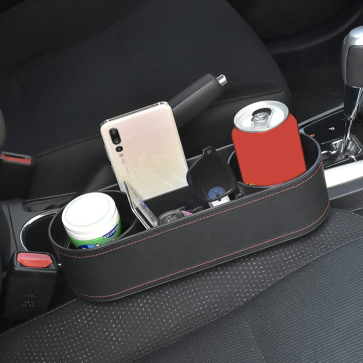 Black car seat side storage tray with two cup inserts and red-stitched trim