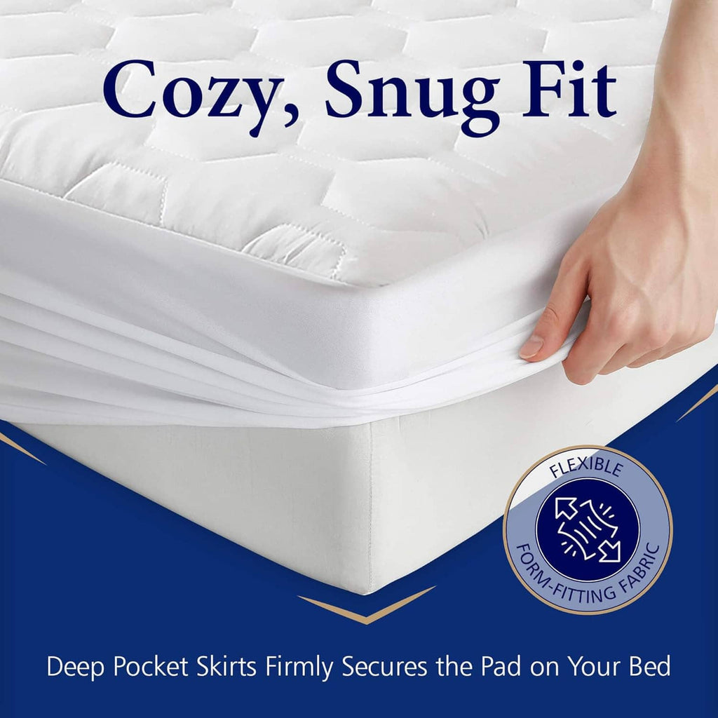 White fitted mattress pad skirt with elastic edge, snugly held by hand