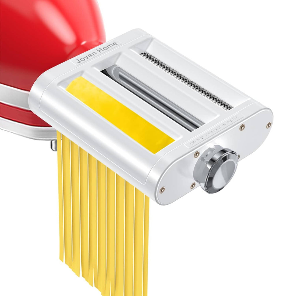 White pasta roller and cutter attachment with yellow pasta sheet and metal rollers