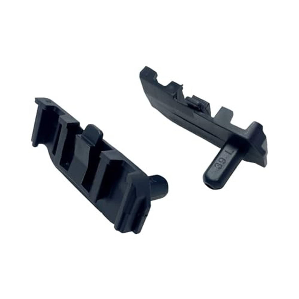 Two dark plastic radiator support brackets with latch feet and embossed markings