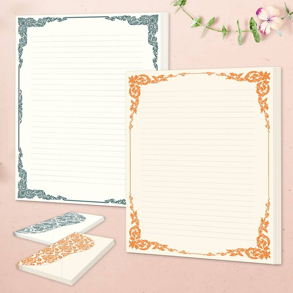 Ivory stationery cards with ornate teal and orange borders, lined paper pages