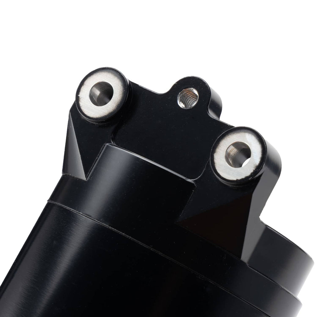 Detail view of black starter motor mounting bracket with two metal fasteners