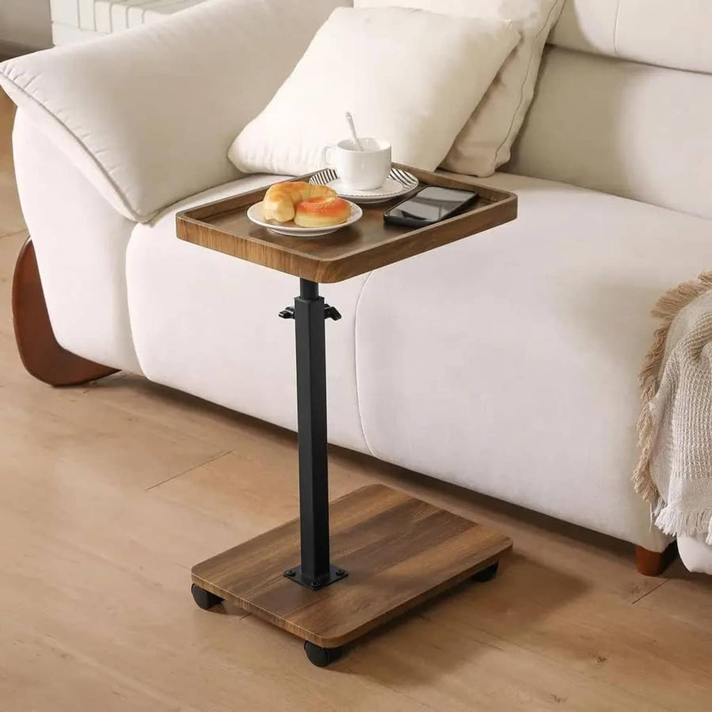 Adjustable height swivel TV tray table with wood top on black pedestal base