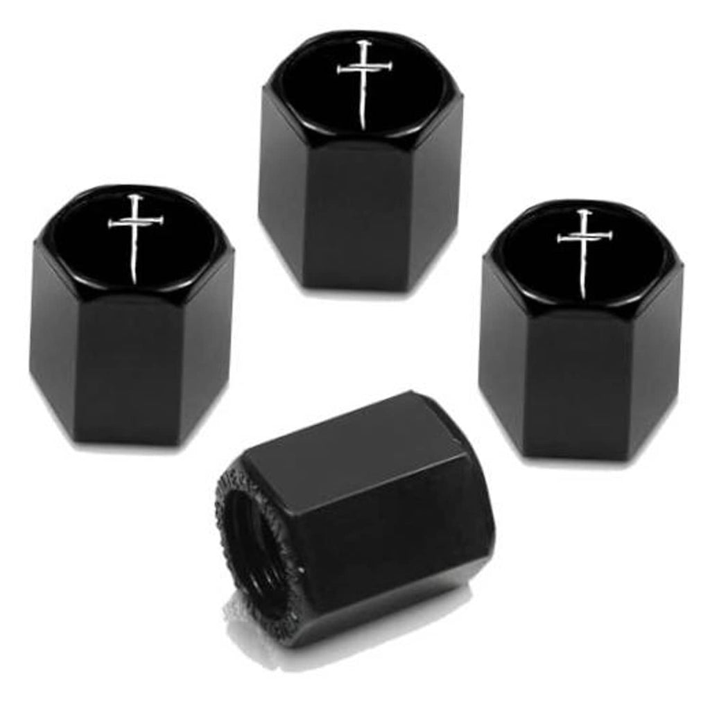 Black tire valve stem caps set with silver cross icons, four-piece with one angled cap shown