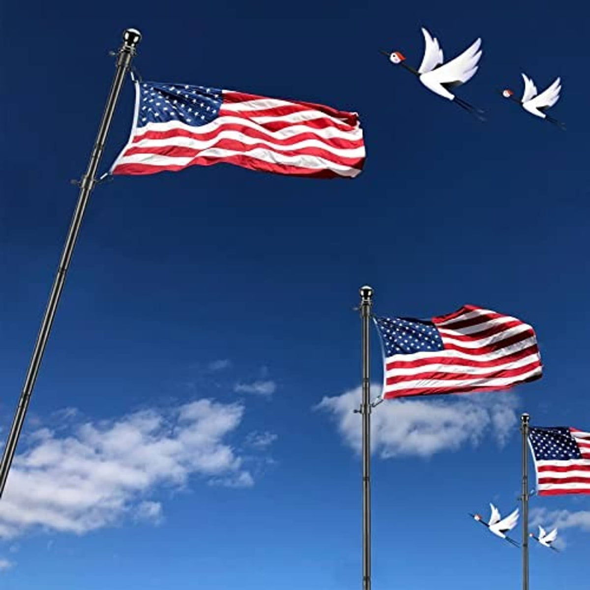 Tall poles with American flags attached, flags shown in motion.
