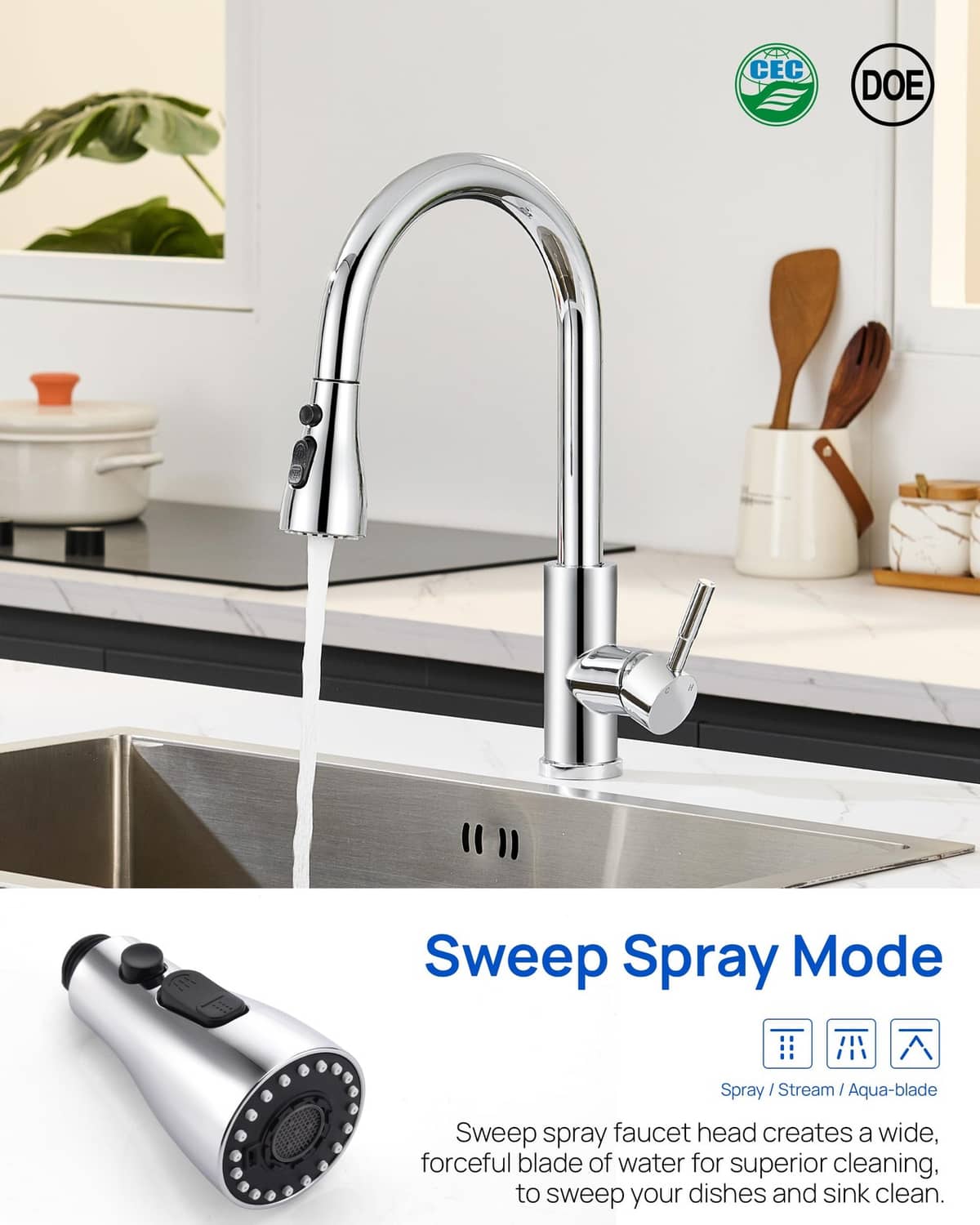 Chrome pull-down faucet sprayer head connected to kitchen sink