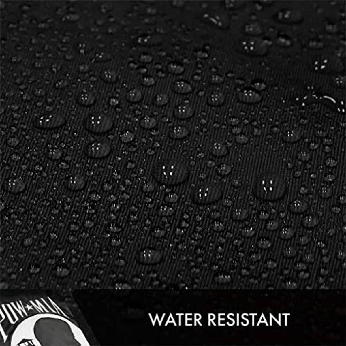 Water-resistant POW-MIA flag fabric with water droplets on black surface