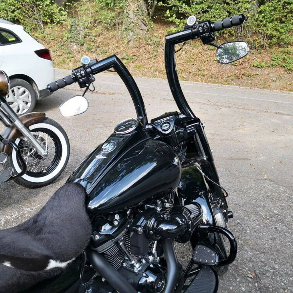 Black 14-inch rise ape hanger handlebar with grips and mirrors on a motorcycle