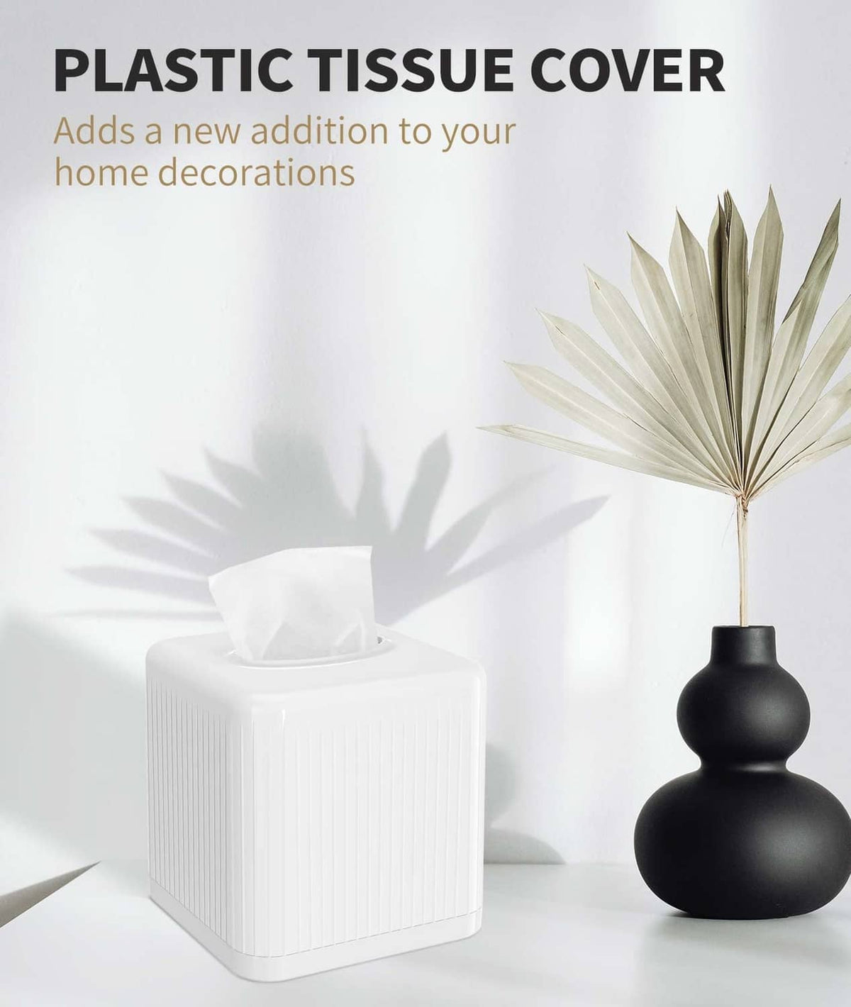 Square white plastic tissue box cover with open top, tissues dispensing through center.