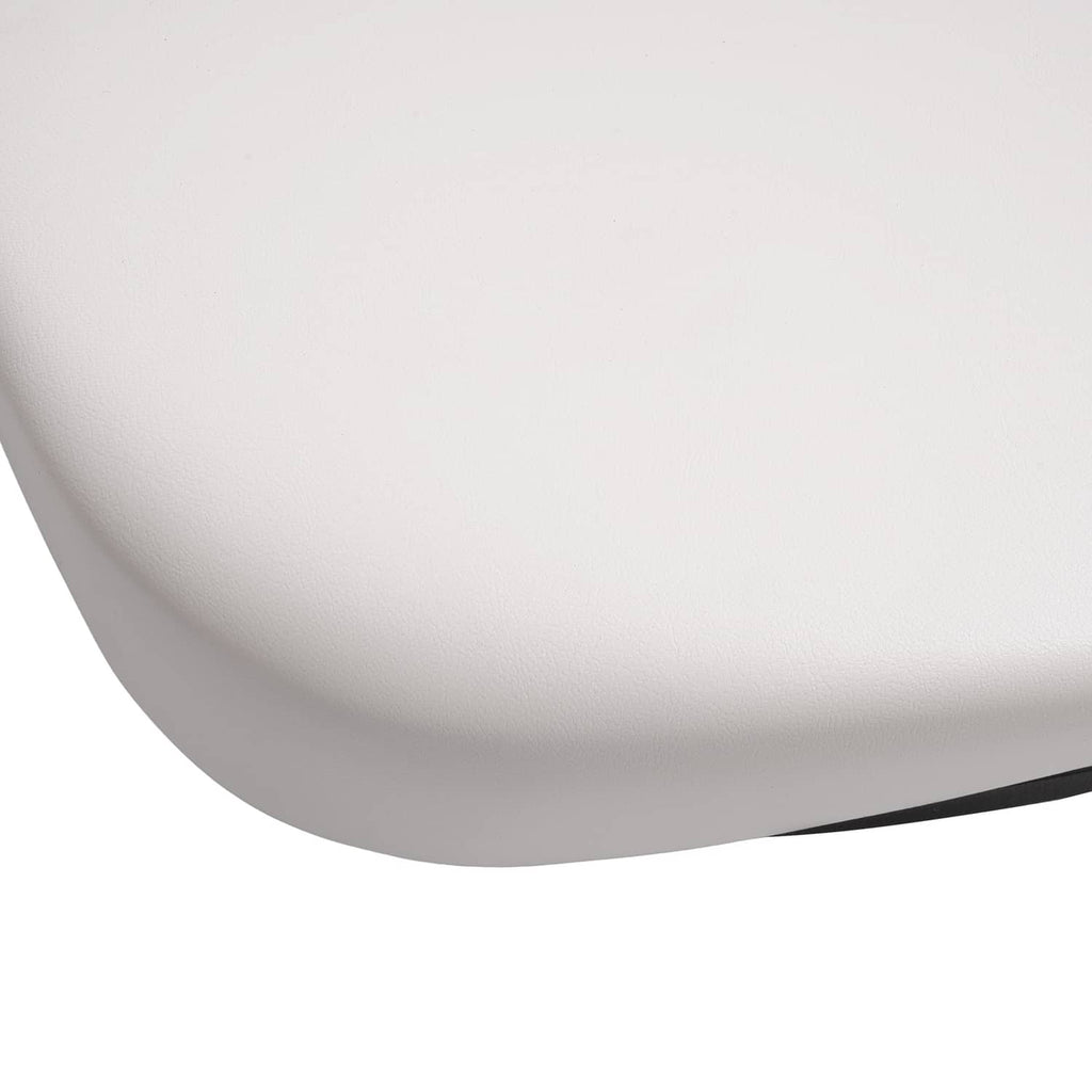Close-up of white seat backrest cushion surface with black outer edge