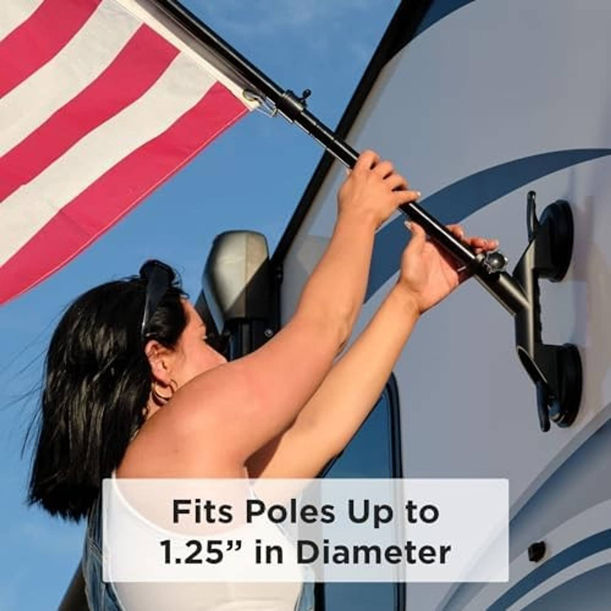 Black suction flagpole holder with pole clamp and two suction cups on RV