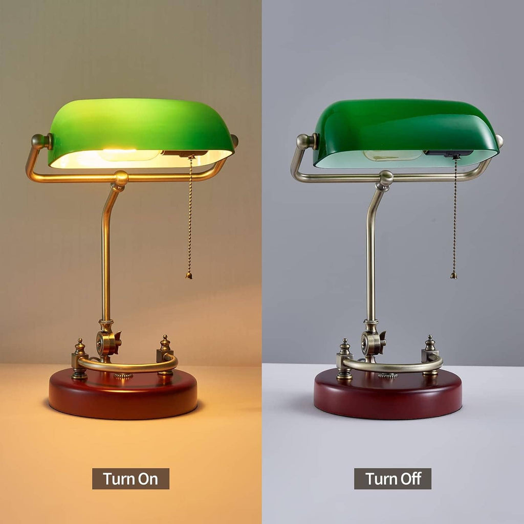 Green glass bankers desk lamp, turn on/off view, with brass frame and red round base