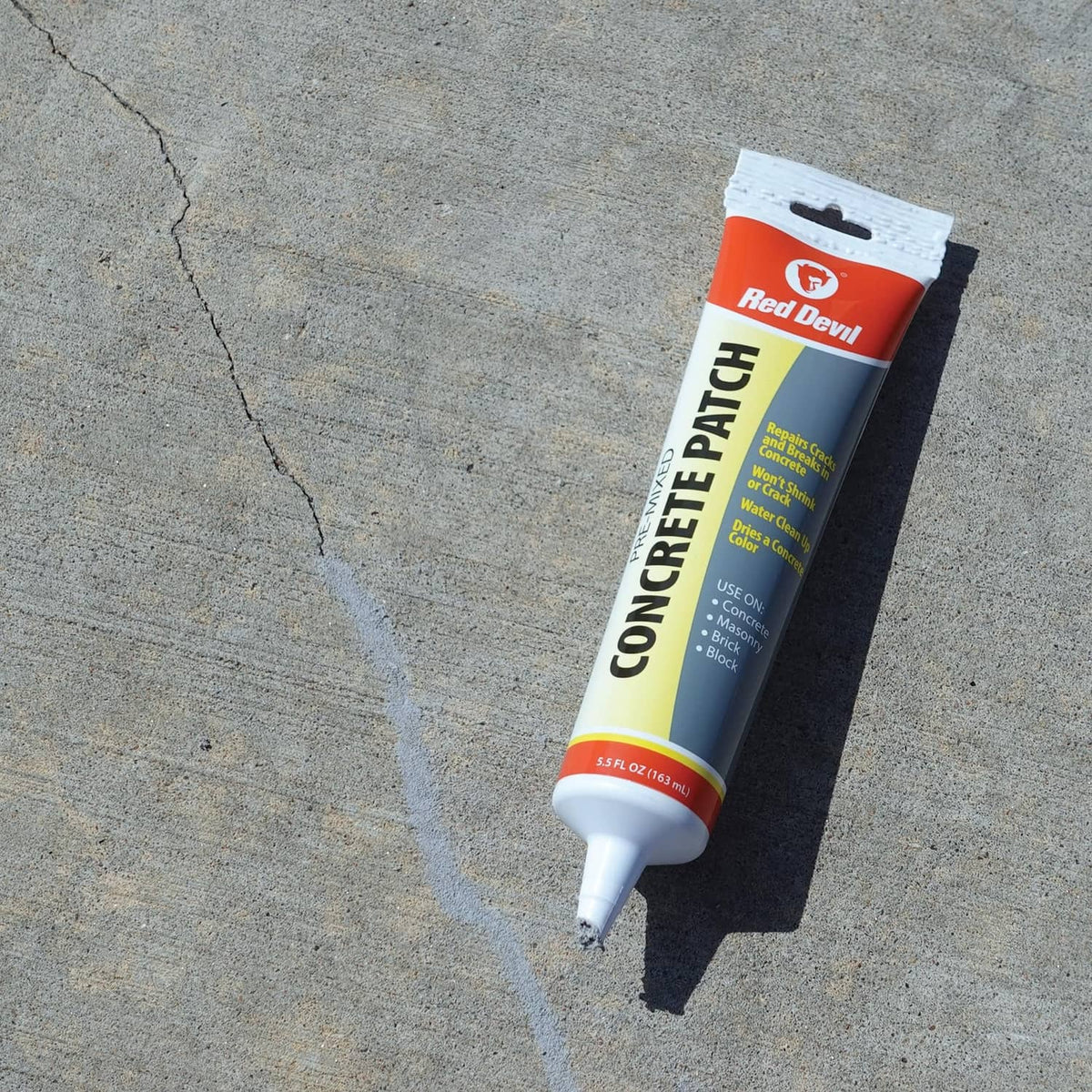 Pre-mixed concrete patch tube for gray cement crack repair on concrete slab