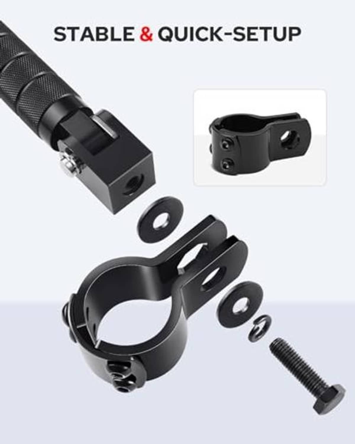 Black foldable footpeg bracket with mounting bolts and spring hardware