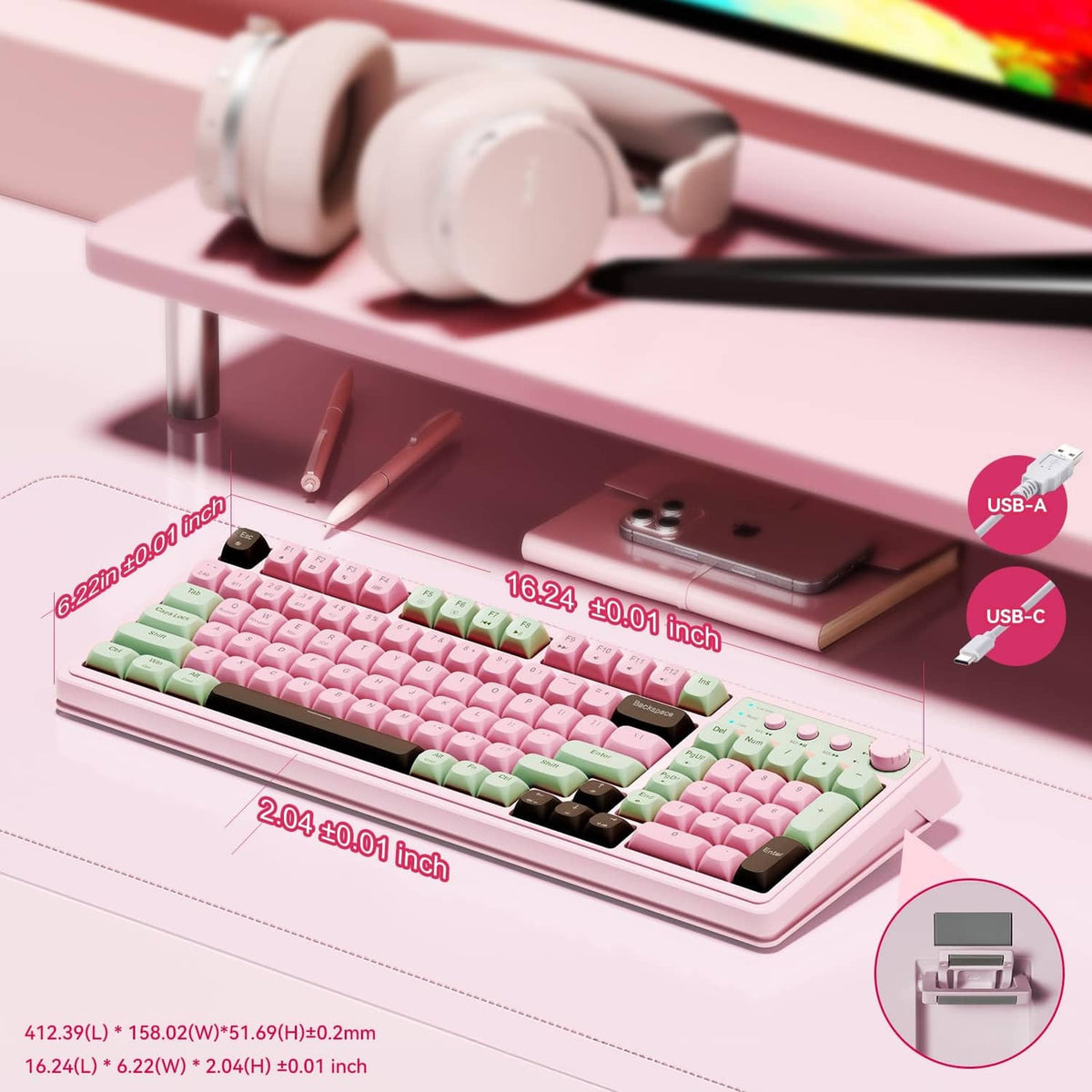 Pastel pink and mint-green keyboard with black bar and USB-A and USB-C ports