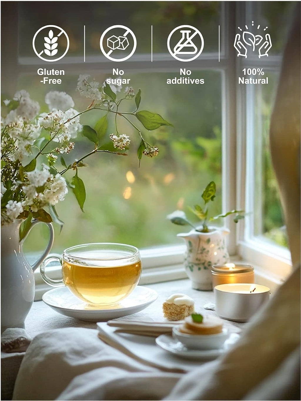 Pale green tea in cup with jasmine blossoms and green leaves
