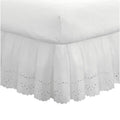 White ruffled eyelet bed skirt with gathered panel and scalloped embroidered edge