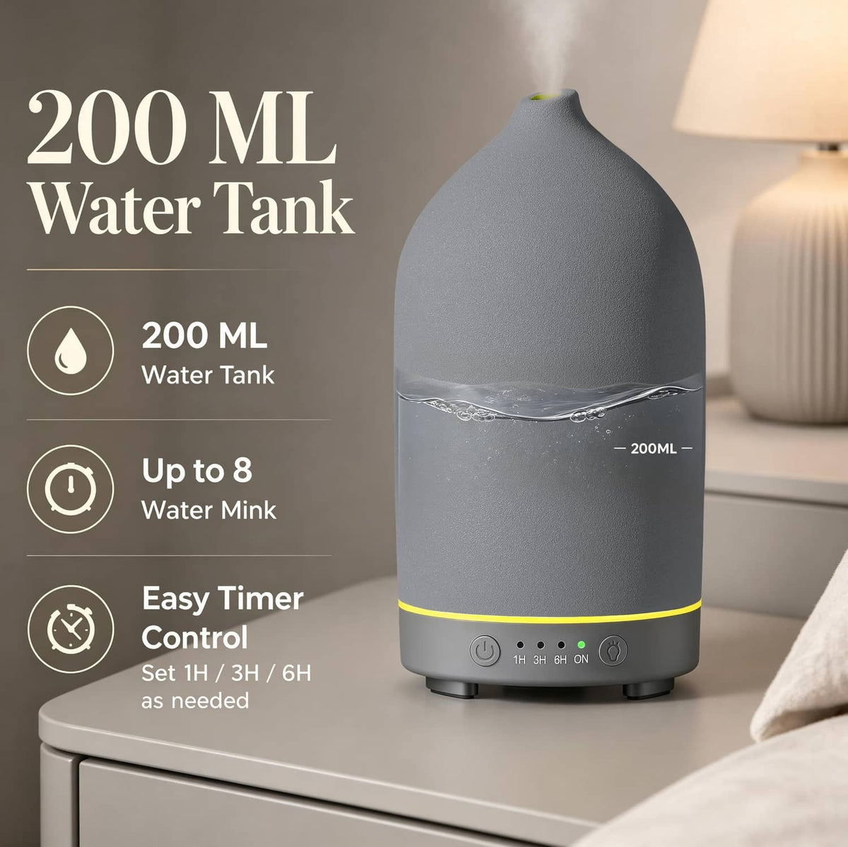 Grey ceramic ultrasonic diffuser with visible water tank window and control panel