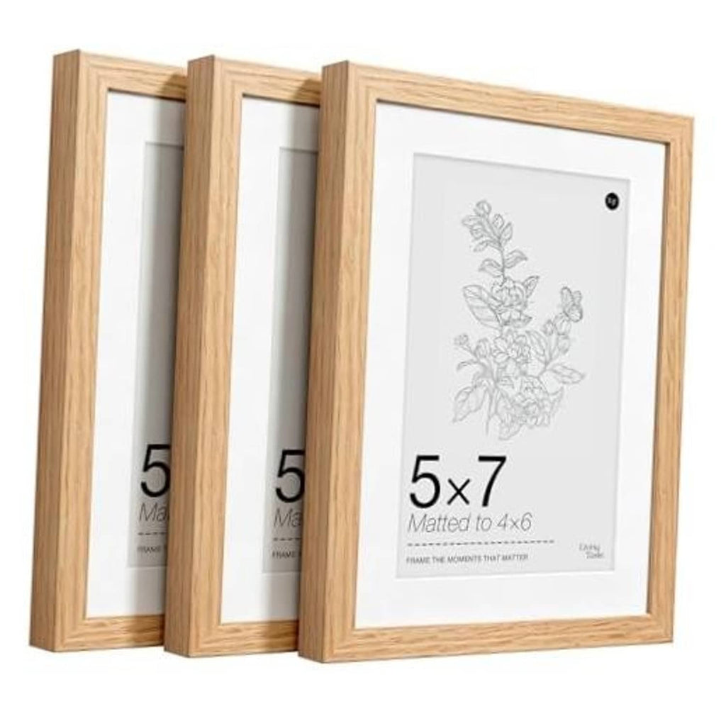 Set of three solid oak 5x7 picture frames with real glass and white matting