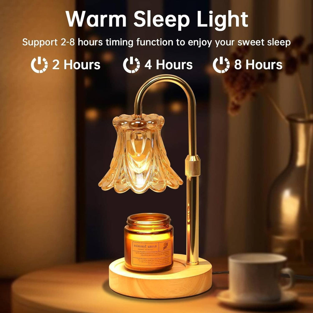 Electric candle warmer lamp with amber glass shade, gold stem, and candle jar on base.