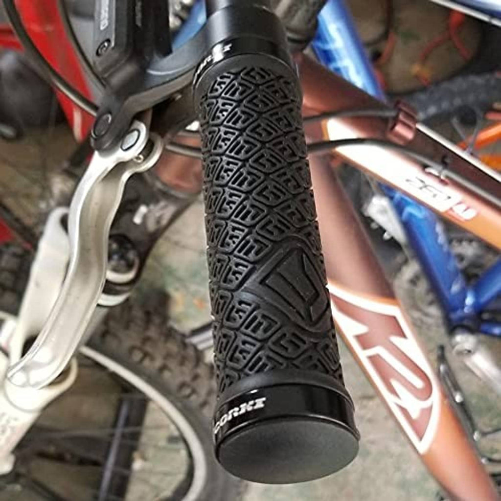 Black bicycle handlebar grips with heavy texture and black double-lock end cap rings