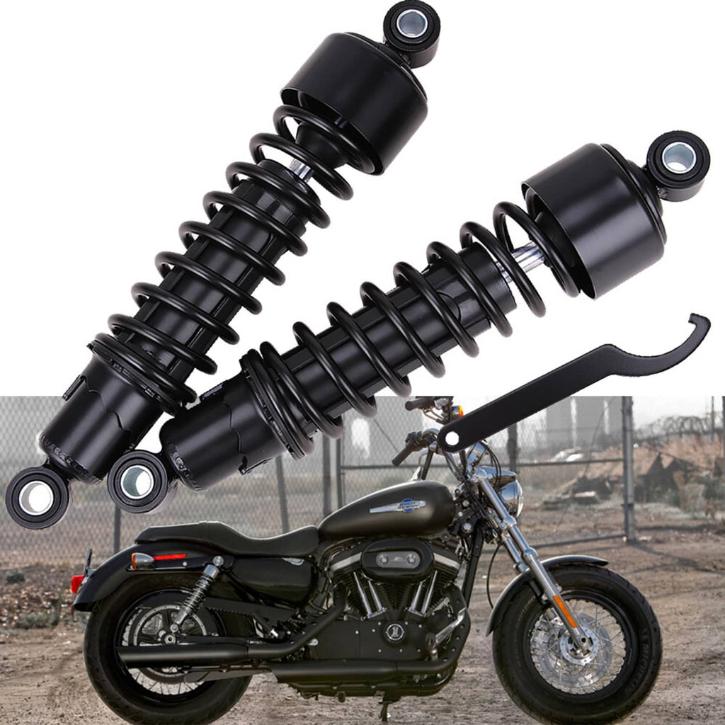Two black rear shock absorbers showing coil springs and mounting hardware