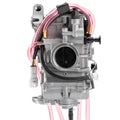 Carburetor assembly with 40mm intake, metal housing, pink fuel lines and black throttle cable