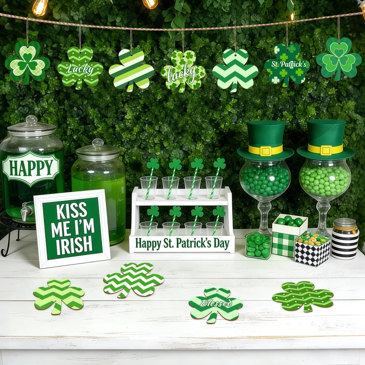Wooden shamrock ornaments scattered on a table with clover-themed decorations