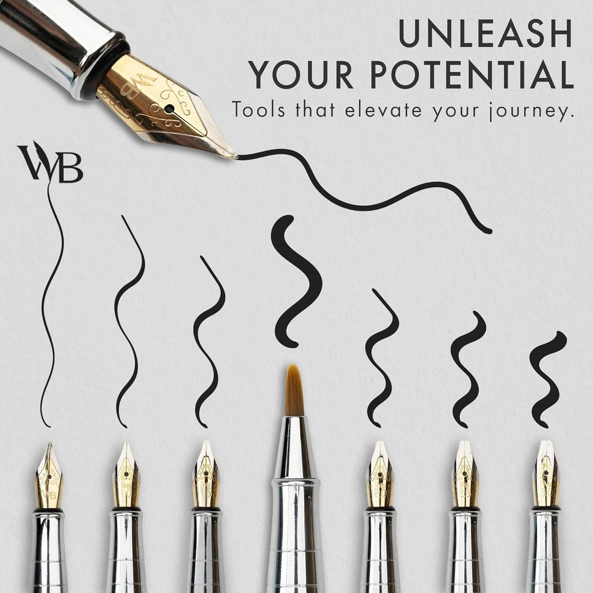 Set of silver calligraphy pens with gold nibs, arranged side by side
