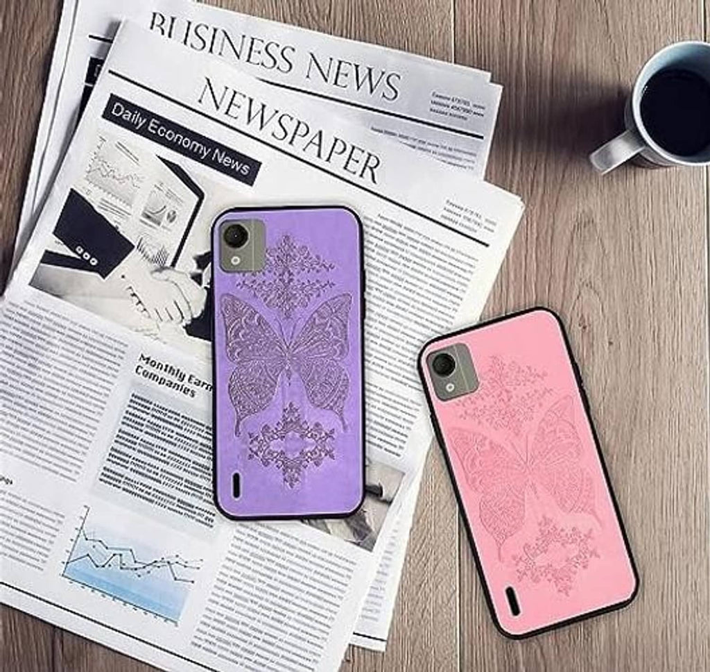 Pink phone case with ornate butterfly pattern shown on a newspaper desk layout
