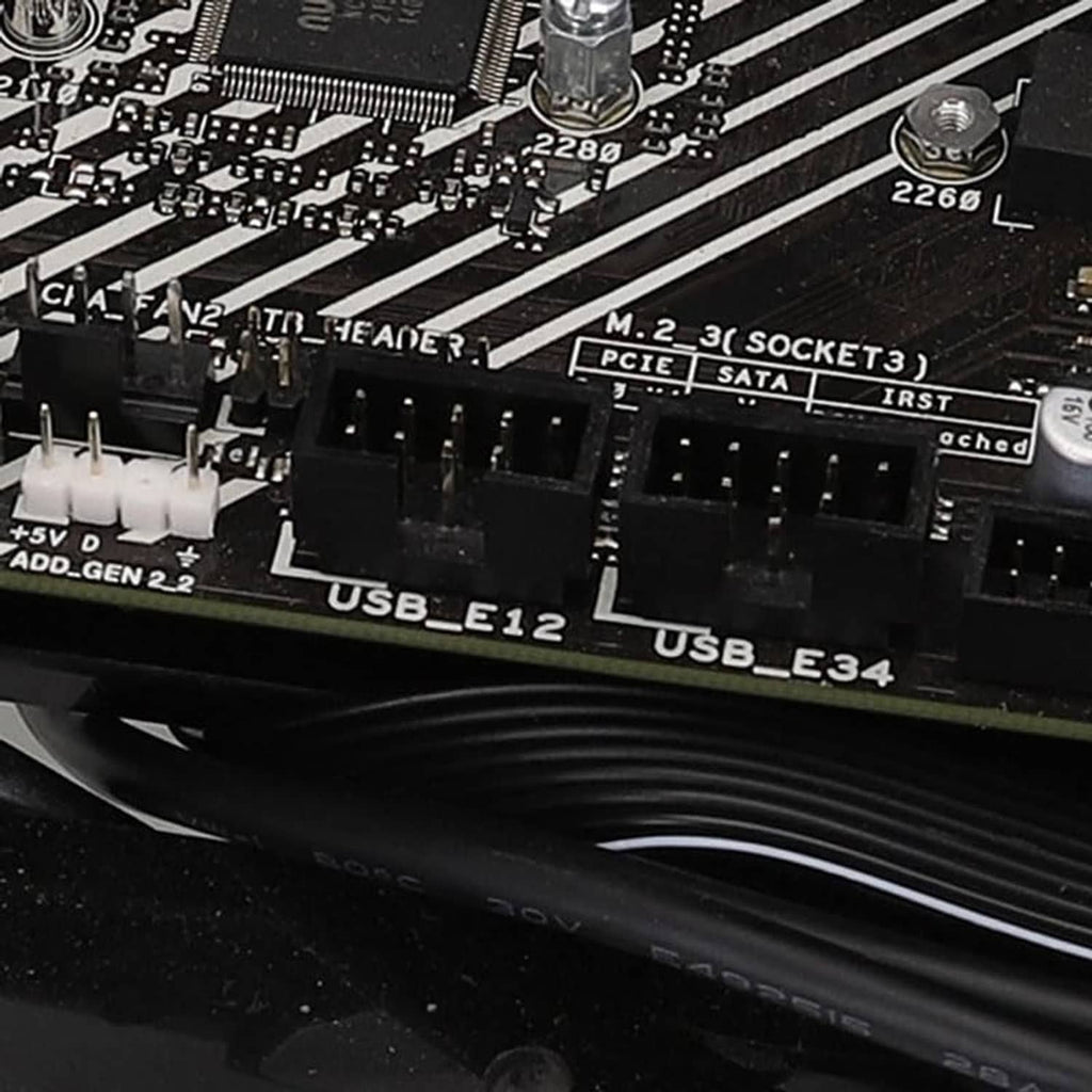 USB 9-pin header splitter cable connectors installed on motherboard USB headers