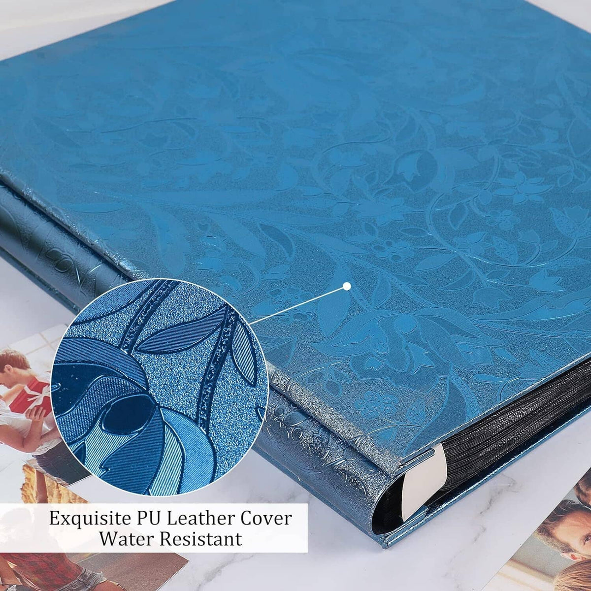 Close-up: blue PU leather-look album cover with black spine and corner.