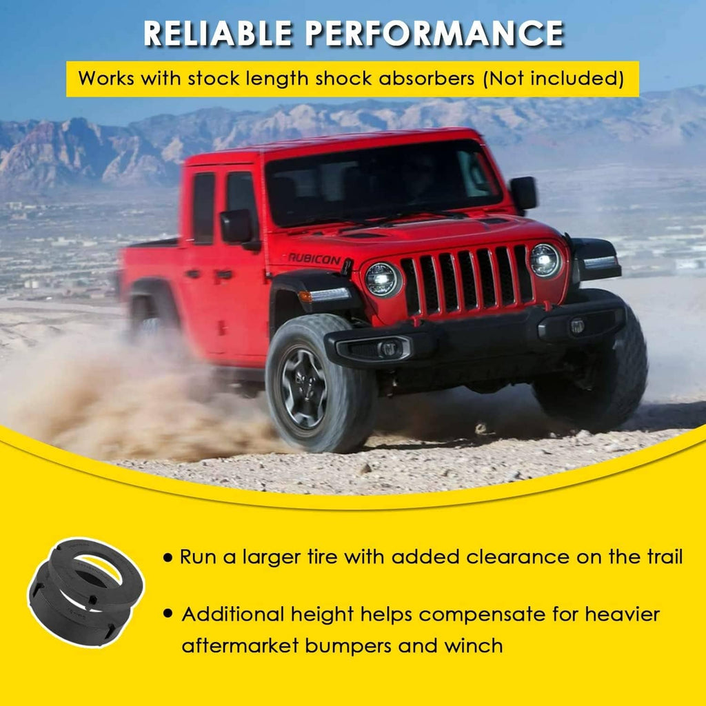 Front coil spring spacer leveling kit for increased tire clearance on a Jeep