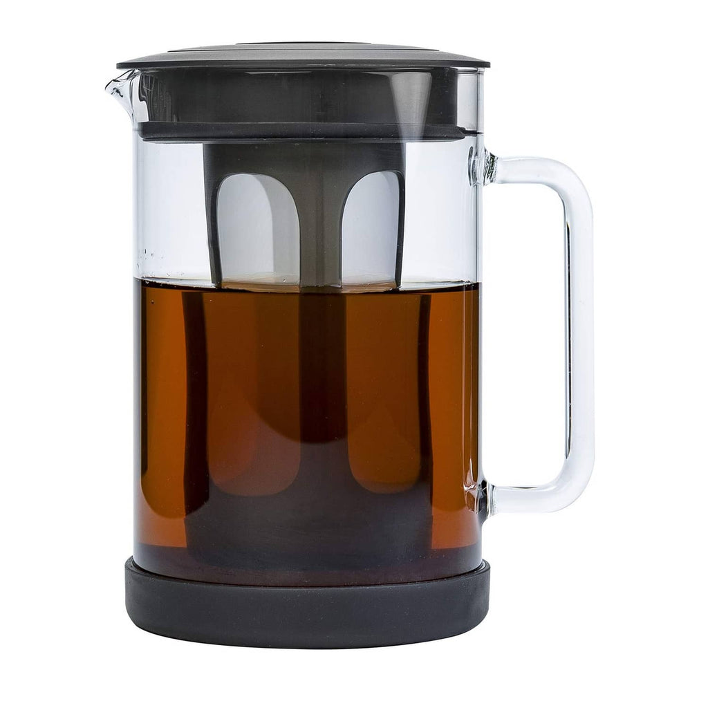 Cold brew coffee maker with clear glass pitcher, black lid, and side handle