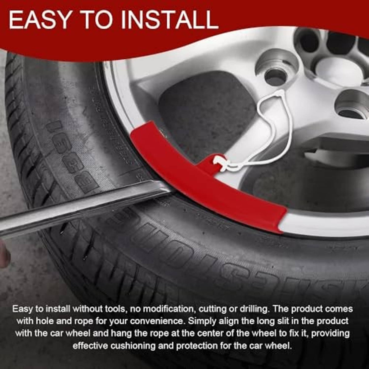 Red rim protector on tire rim edge with white rope tie for securing