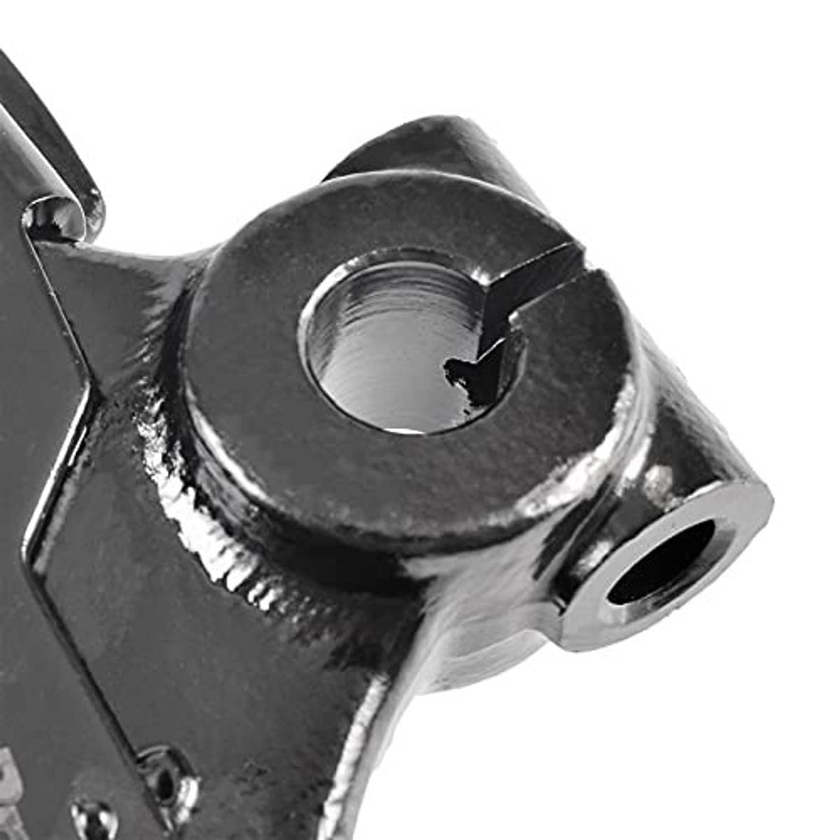 Control arm ball joint close-up with black housing and metal stud