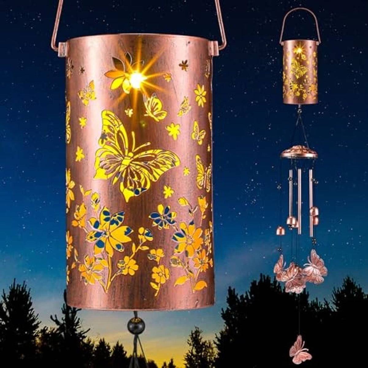 Two solar wind chime lanterns glowing at night, copper-pink cylinders with butterfly designs