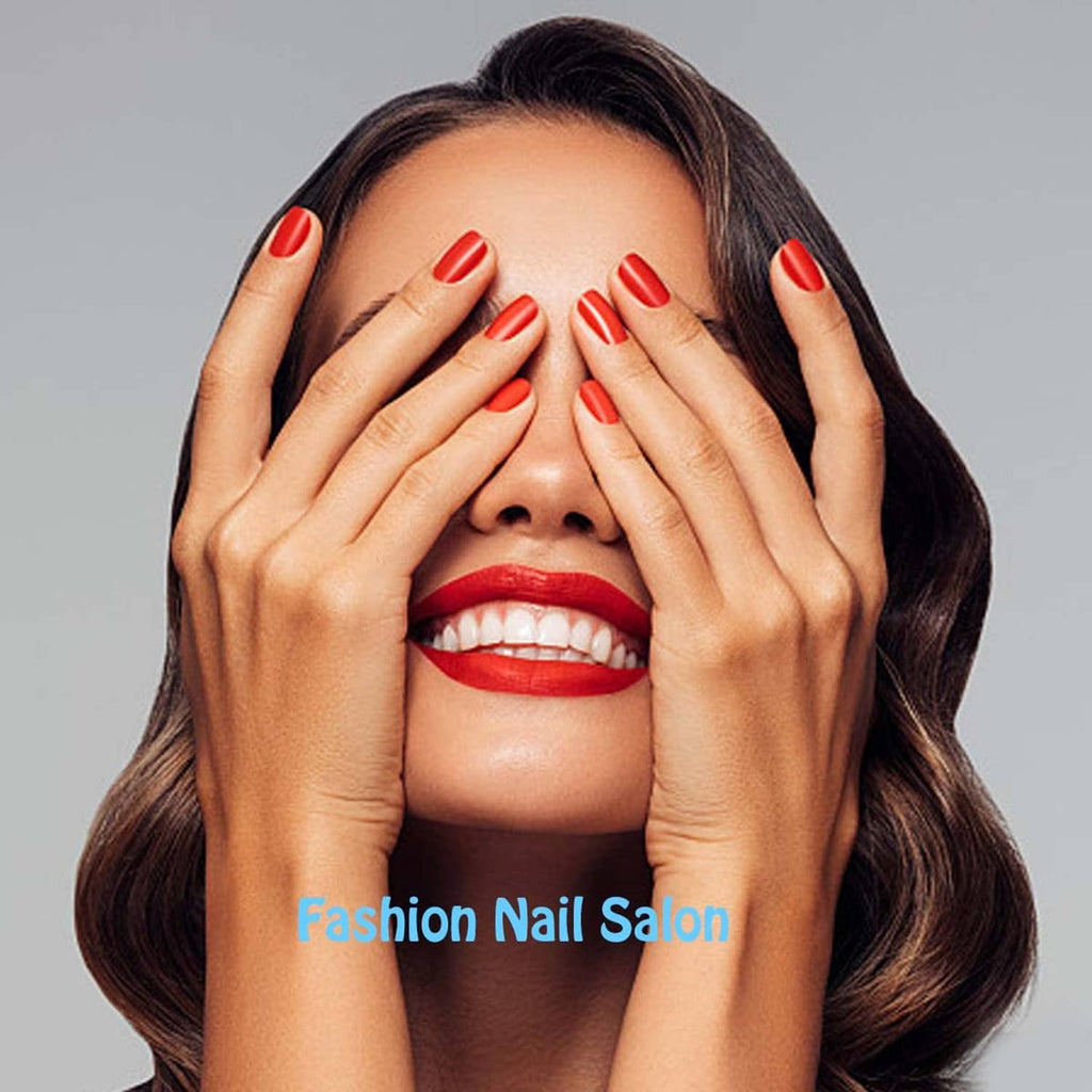 Woman wearing glossy press-on style nails in a bright red color, medium length