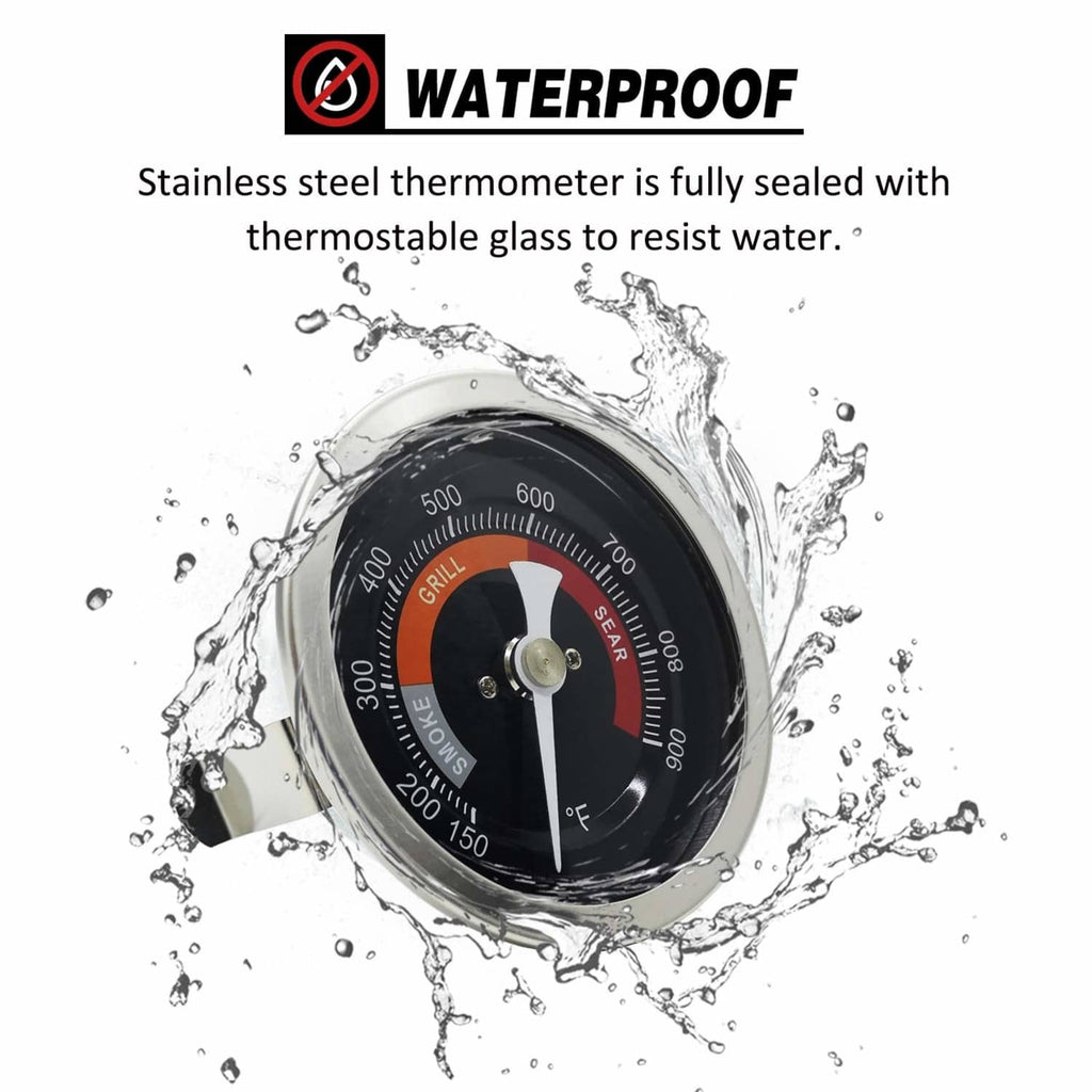 Waterproof grill thermometer with black dial and stainless bezel amid splash water