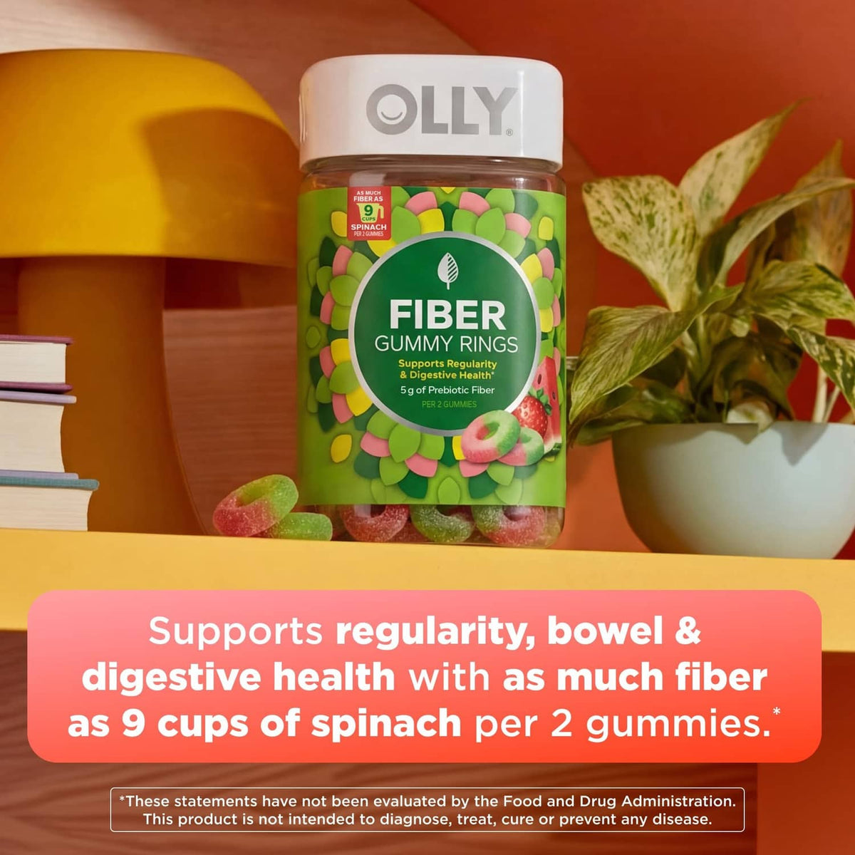 OLLY Fiber gummy rings supplement bottle with colorful gummy ring pieces