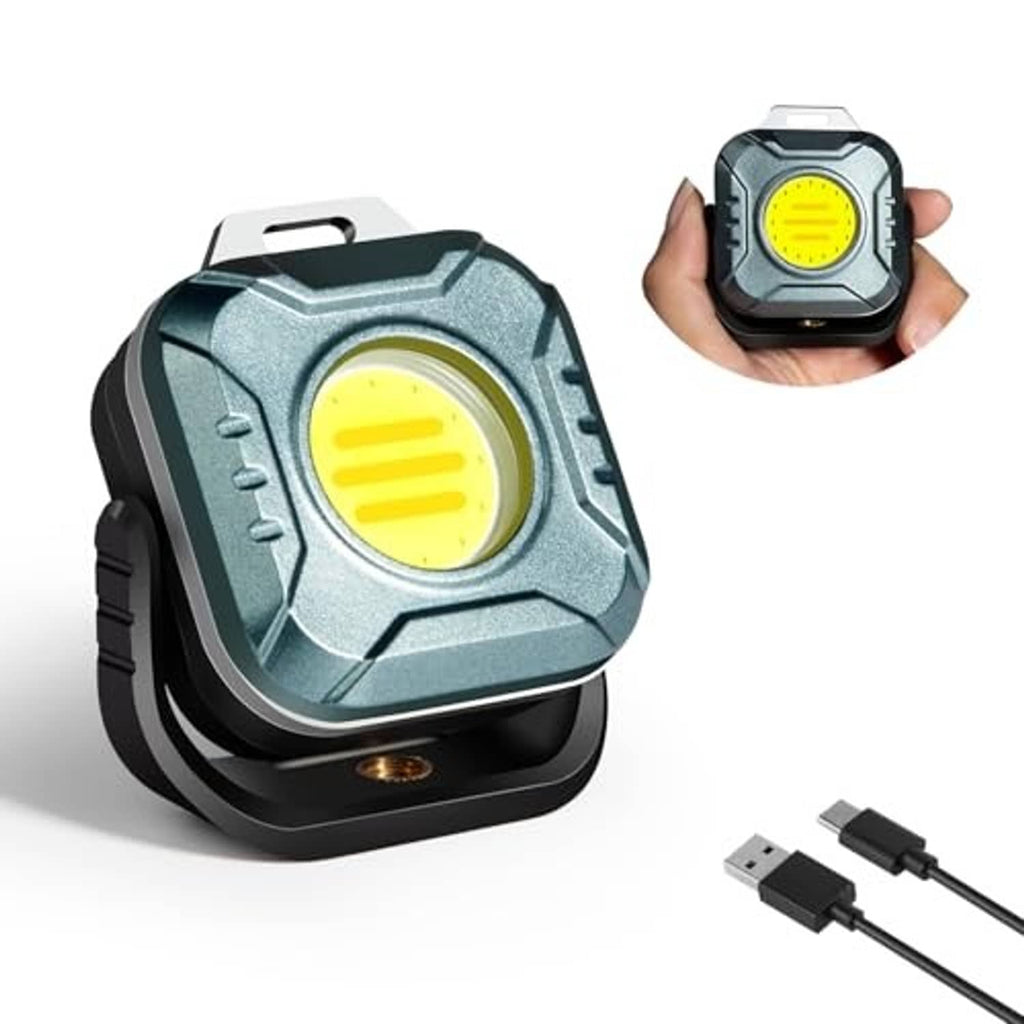 Magnetic work light with grey body, yellow LED, and included USB charging cables