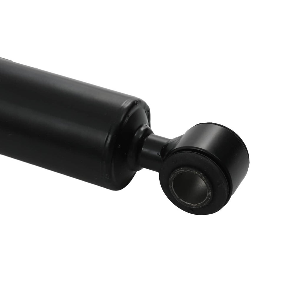 Black shock absorber end bushing attached to a smooth black tube