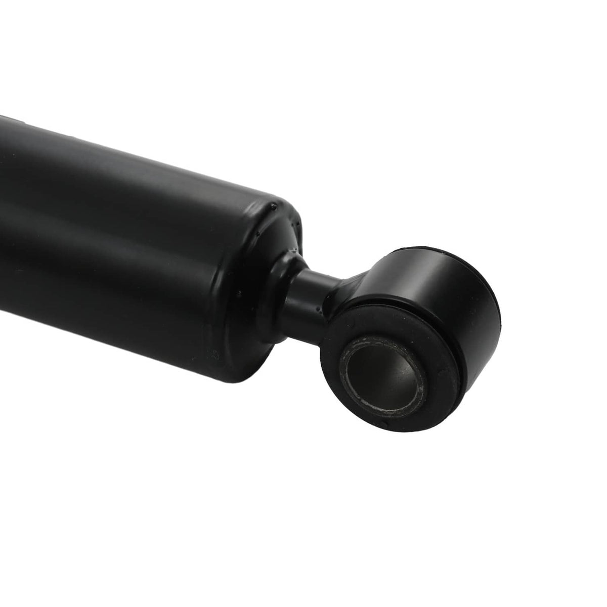 Black shock absorber end bushing attached to a smooth black tube
