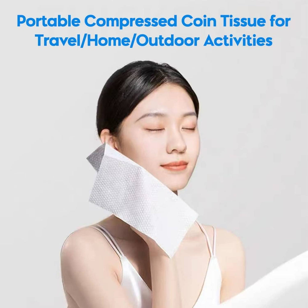 White facial compressed towel sheet held on face for travel or home use
