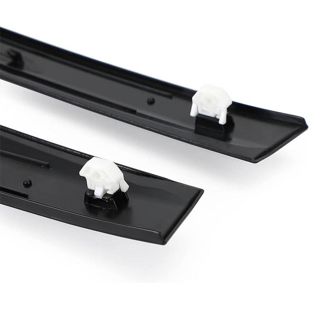 Close-up of black door sash trim bars with white plastic mounting clips