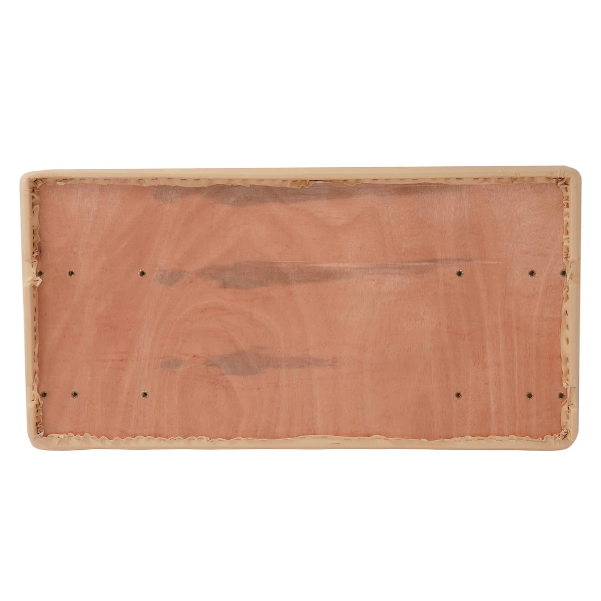 Rectangular underside panel of tan seat bottom with stitched edge and fastener holes