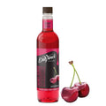 Cherry syrup bottle with DaVinci Gourmet label and two ripe cherries